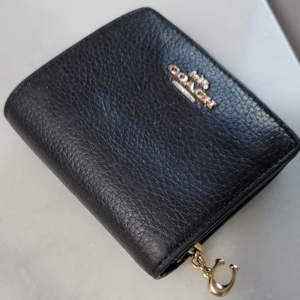 Black Coach for sale great condition.